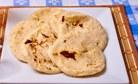 Pupusas Revueltas on a plate