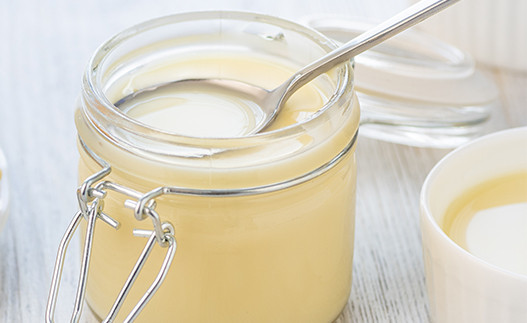 Sweetened Condensed Milk in a glass jar