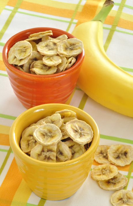 Dried banana chips in mugs