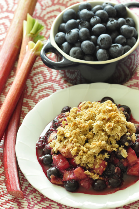 rhubarb blueberry crisp on a plate