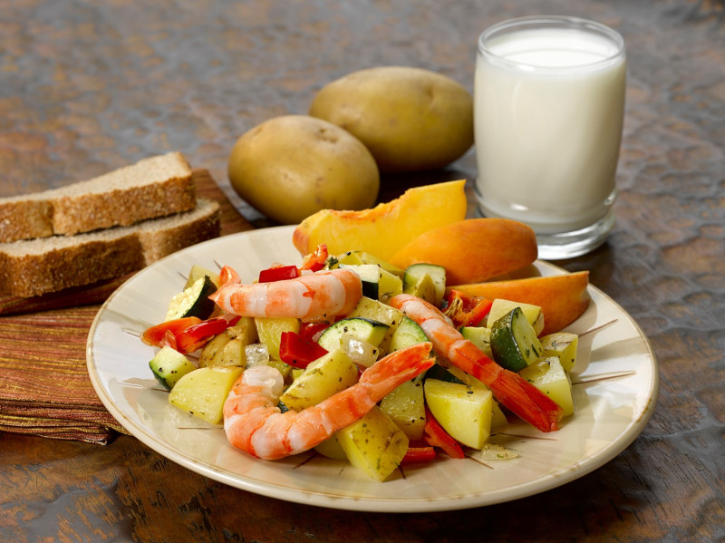Yellow Potato and Red Pepper Shrimp Sauté on a plate