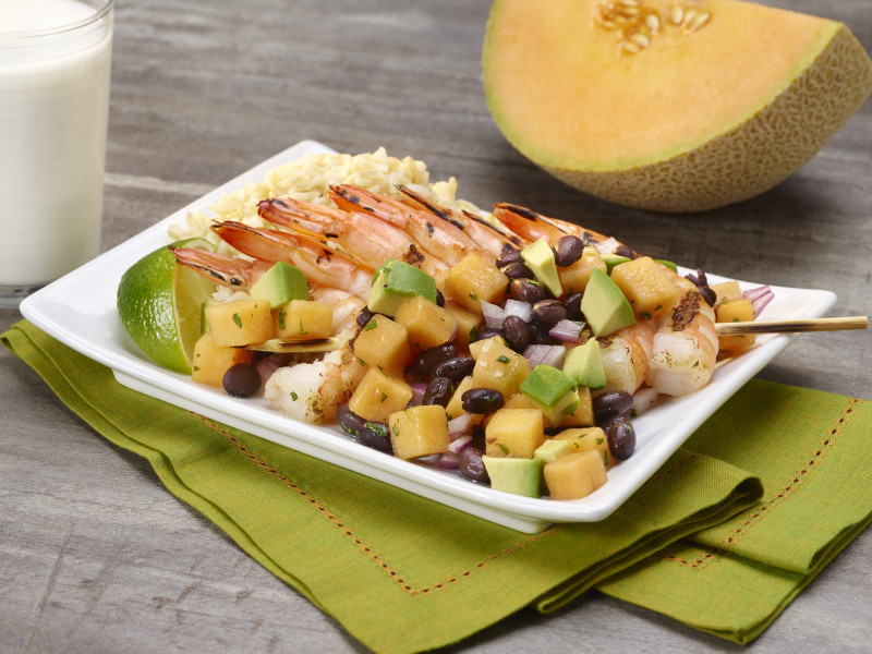 Grilled Shrimp with Cantaloupe Avocado Salsa on a platter