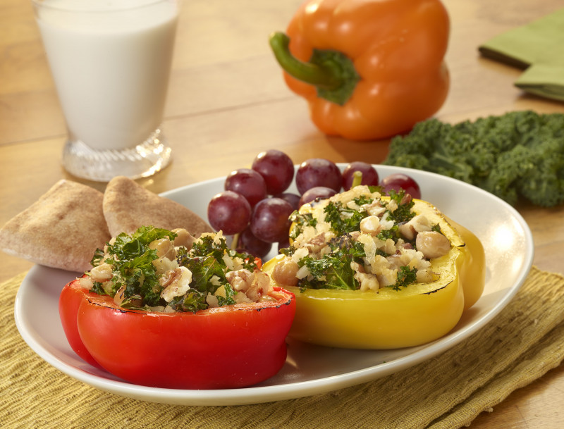 Rainbow Bell Pepper Boats with Garbanzo Beans and Kale on a plate